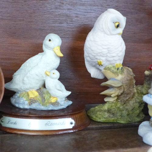 631 - A Border Fine Arts figure marked (Ray) Ayres, a Cherished Teddies figure and seven other figures