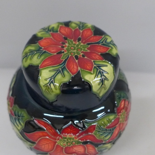 634 - A 2002 Moorcroft Poinsettia christmas ginger jar, designed by Sandra Dance, 11cm