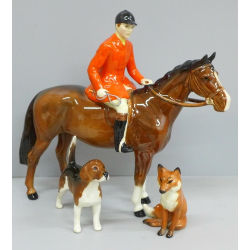 639 - A Beswick huntsman, fox and hound