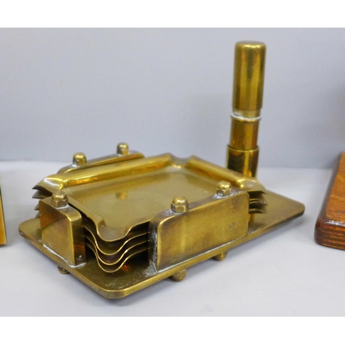 640 - A set of postal scales, a brass ashtray stand and a brass cigarette box