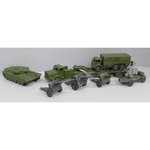 645 - A collection of Dinky Supertoys; Tank transporter 660, tank 651, 10 ton army truck 522 and four Lone... 