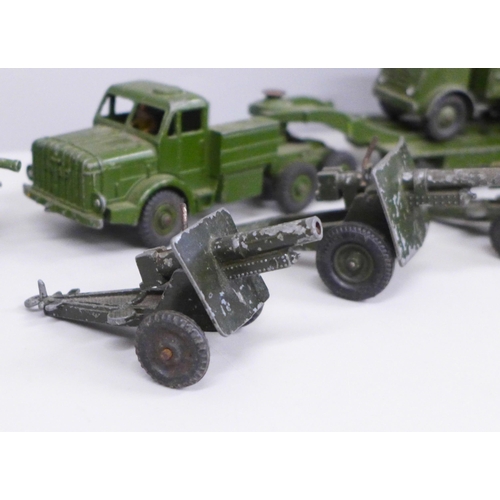 645 - A collection of Dinky Supertoys; Tank transporter 660, tank 651, 10 ton army truck 522 and four Lone... 