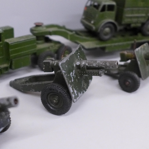 645 - A collection of Dinky Supertoys; Tank transporter 660, tank 651, 10 ton army truck 522 and four Lone... 