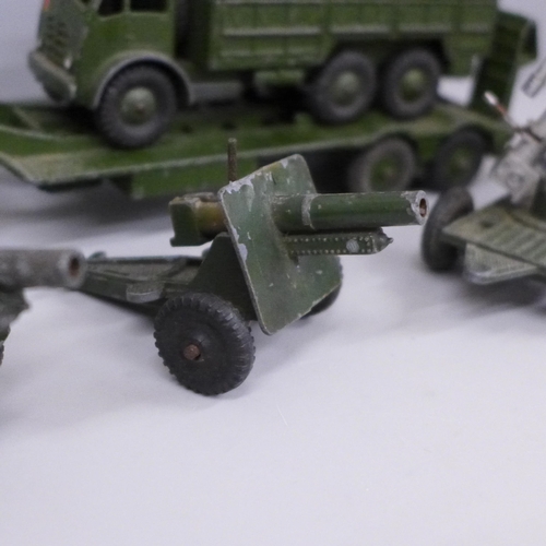 645 - A collection of Dinky Supertoys; Tank transporter 660, tank 651, 10 ton army truck 522 and four Lone... 