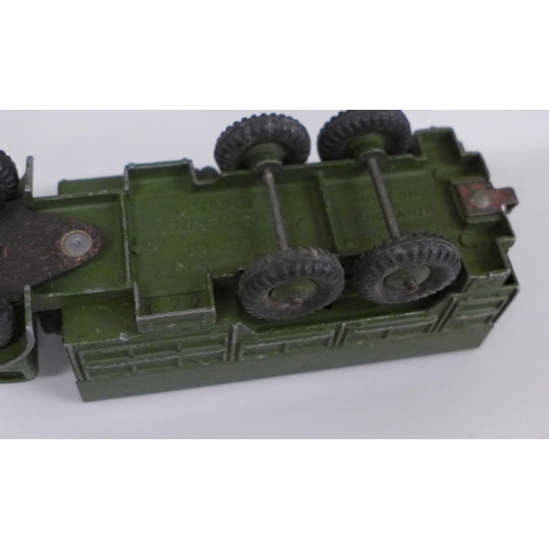 645 - A collection of Dinky Supertoys; Tank transporter 660, tank 651, 10 ton army truck 522 and four Lone... 