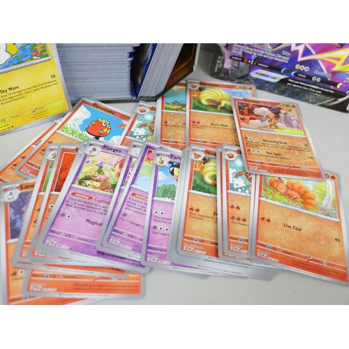 650 - Over six hundred Holo Pokemon cards with one large V-Union rule card