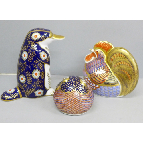 652A - Three Royal Crown Derby paperweights with silver stoppers, including cockerel and duck-billed platyp... 