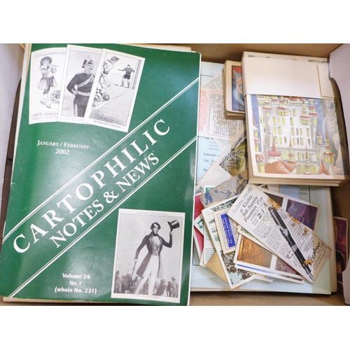 654 - A group of cigarette card pricing books, etc.