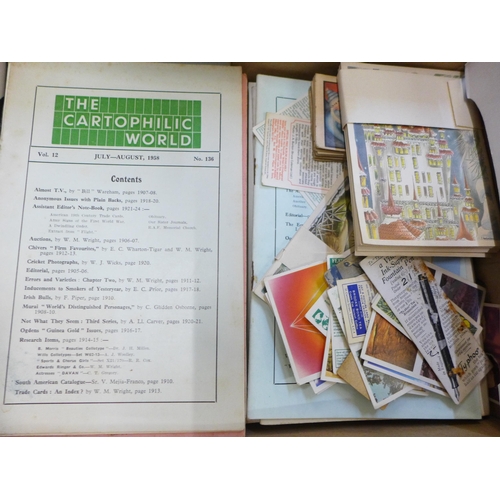 654 - A group of cigarette card pricing books, etc.