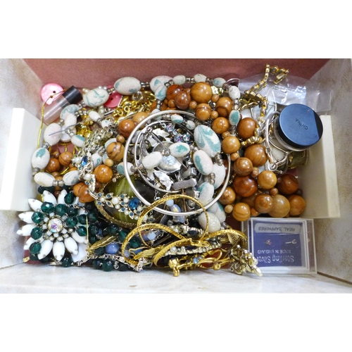 656 - Three boxes of assorted costume jewellery