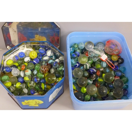 663 - Two tubs of vintage marbles including early 20th Century