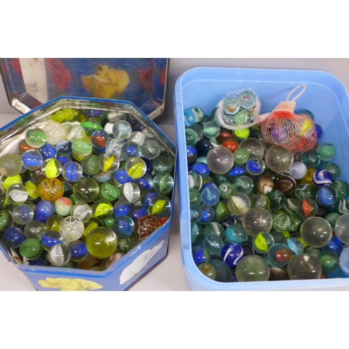 663 - Two tubs of vintage marbles including early 20th Century