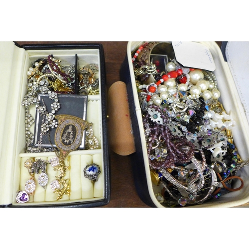 676 - Two boxes of costume jewellery