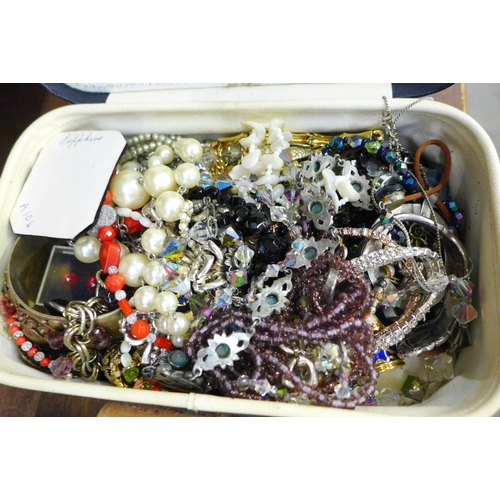 676 - Two boxes of costume jewellery