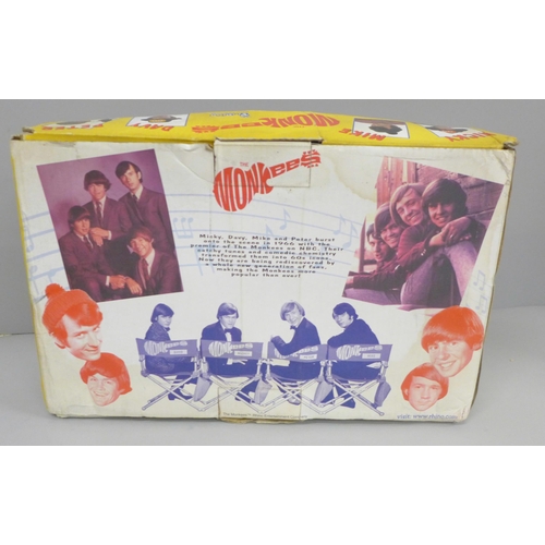 691 - A set of Funko The Monkees Wacky Wobblers, boxed (produced circa 2002)