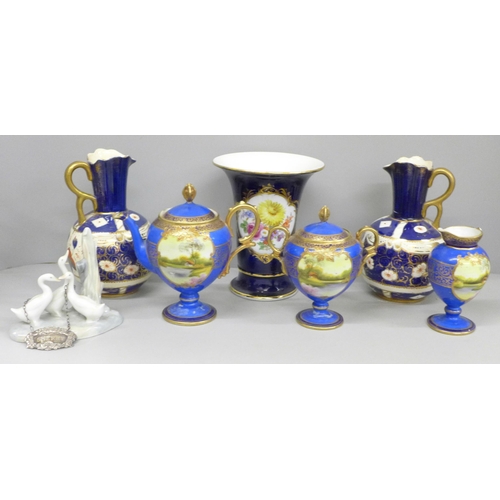 692 - A Noritake decorative three piece tea service, jug a/f, handle, a Nao figure group of ducks, a pair ... 