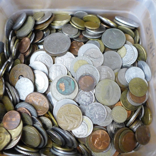 694 - A plastic tub of foreign coins, 6.8kg