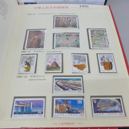 696 - A box of three China special stamp books and a few items of postal history