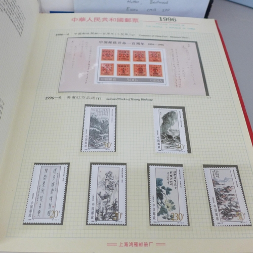 696 - A box of three China special stamp books and a few items of postal history