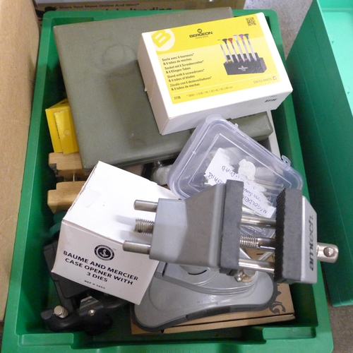 703 - Three boxes of watch repair tools, accessories including vices, Bergeon screwdrivers and Breitling a... 