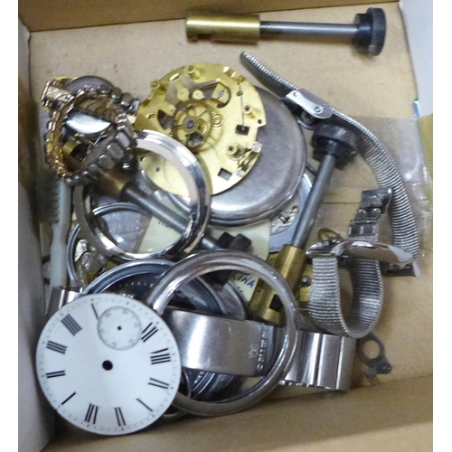 713 - A box of mixed watch parts, movements, etc.