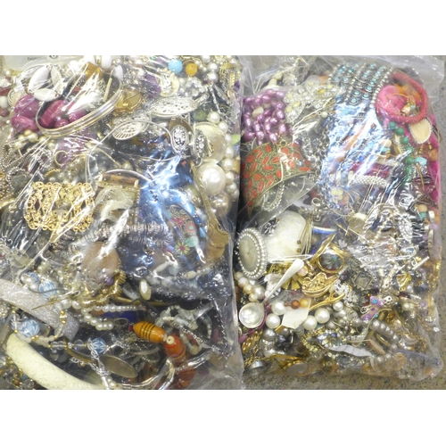 720 - Two bags of costume jewellery