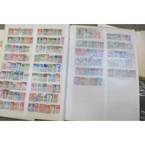 722 - An album of stamps, including penny reds and two-penny blues, an album of German third-reich stamps ... 