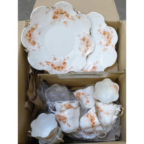 724 - A Staffordshire tea service with fluted cups and shaped dinner plates