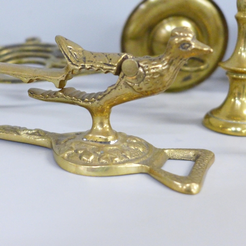 743 - A pair of brass sconces, free standing Lands End brass nutcracker, free standing bird nutcracker/bot... 