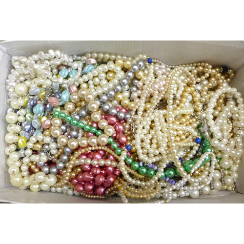 754 - A collection of faux pearl necklets and bracelets