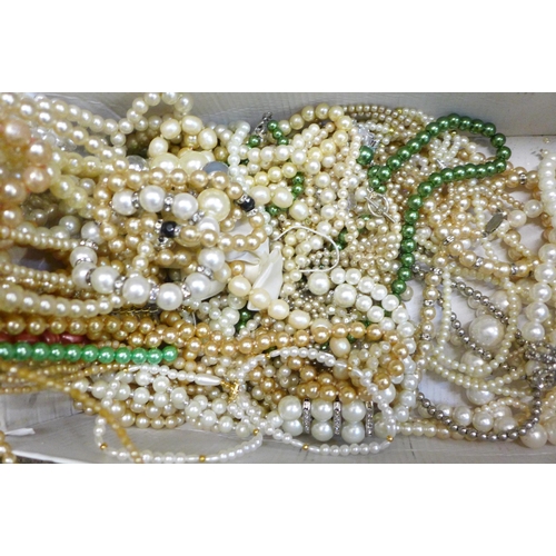 754 - A collection of faux pearl necklets and bracelets