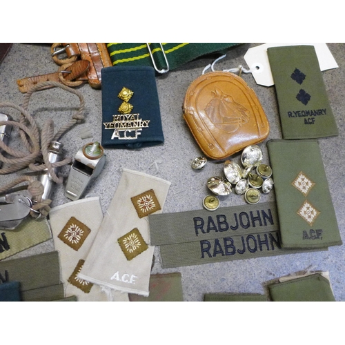 755 - Military uniform belts, uniform badges, name patches 'Rabjohn', lighters, whistles, etc.