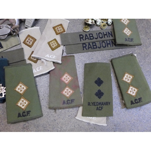 755 - Military uniform belts, uniform badges, name patches 'Rabjohn', lighters, whistles, etc.