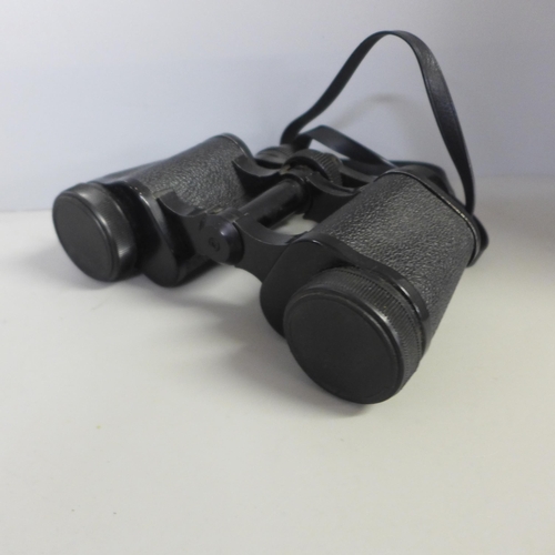 760 - Four pairs of binoculars; Prinz 10 x 50, Chinon zoom 7-15 x 35, Chinon 7 x 50 and Boots 8 x 30