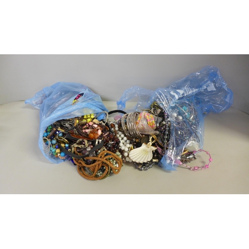 761 - Two bags of costume jewellery