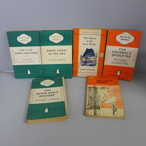 764 - A box of early Penguin books, mainly orange and green covers, 59 in total