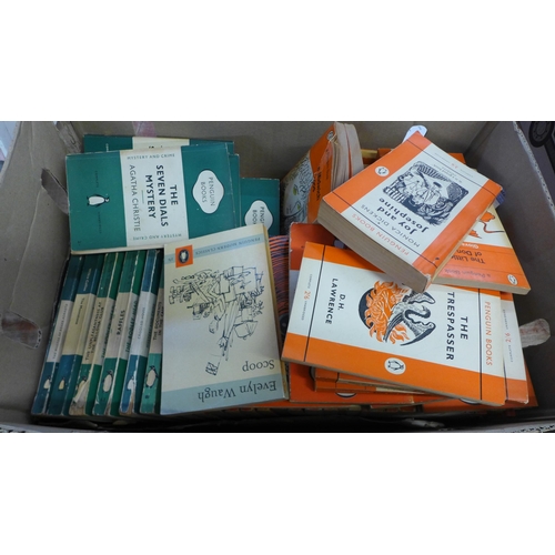 764 - A box of early Penguin books, mainly orange and green covers, 59 in total