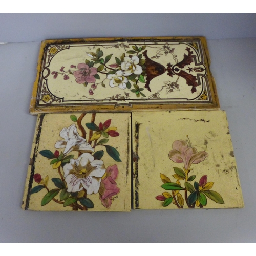 769 - Two sets of five Victorian fireplace tiles (forms a picture of flowers) and one larger tile