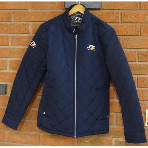 773 - Three jackets; Isle of Man TT jacket (ladies large), a Shell Ferrari partners jacket and a sheepskin... 