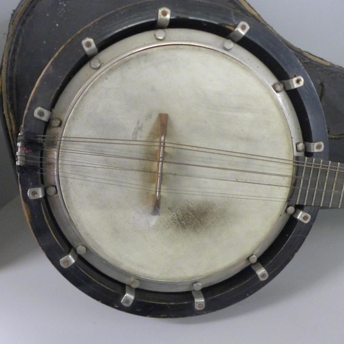 783 - A cased banjo