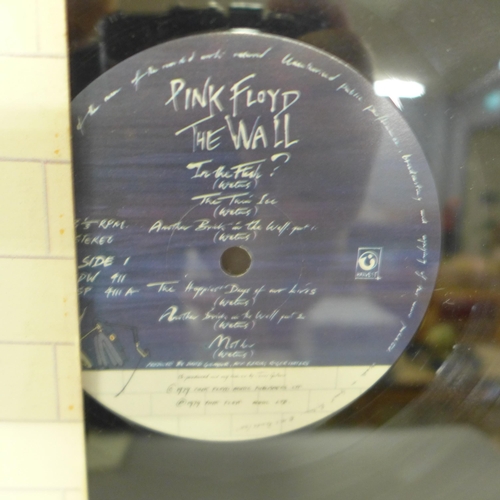 784 - A Pink Floyd Another Brick in the Wall framed display with signature