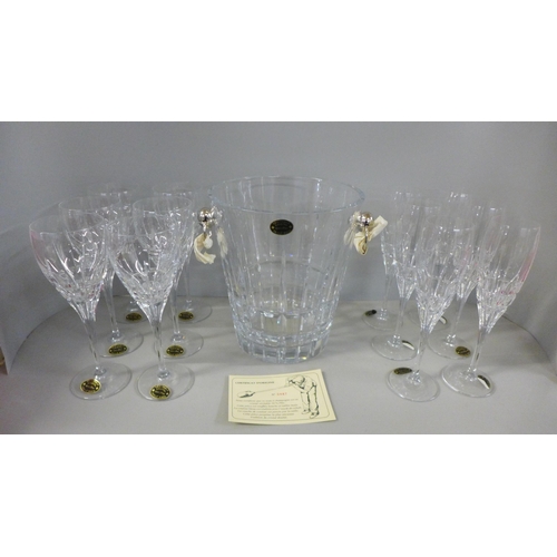 794 - A heavy crystal glass champagne chiller and two boxed sets of six crystal champagne glasses, 24% Pb0... 