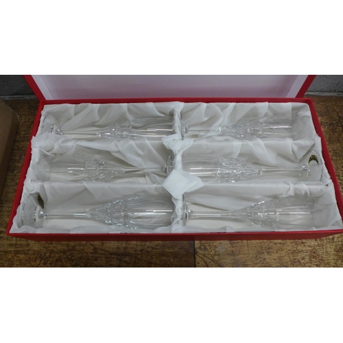 794 - A heavy crystal glass champagne chiller and two boxed sets of six crystal champagne glasses, 24% Pb0... 