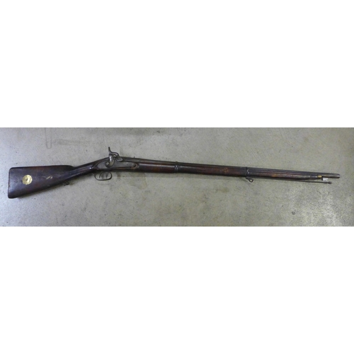 798 - A 19th century percussion rifle with 1897 date carved in stock