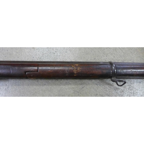 798 - A 19th century percussion rifle with 1897 date carved in stock