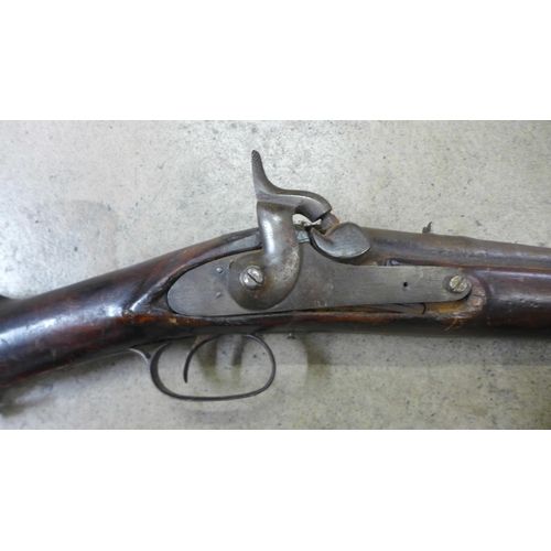 798 - A 19th century percussion rifle with 1897 date carved in stock