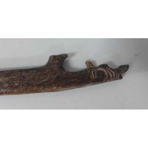 803 - An early Egyptian stick with carved bird top