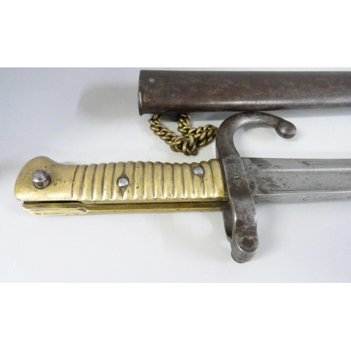 811 - A large French bayonet, dated 1871, T54148, number on scabbard worn but does match the bayonet **PLE... 