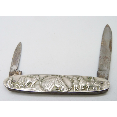 844 - A vintage pocket knife with horse and gun dog detail