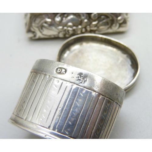 849 - Three hallmarked silver boxes, 84g, together with a white metal box with continental control mark